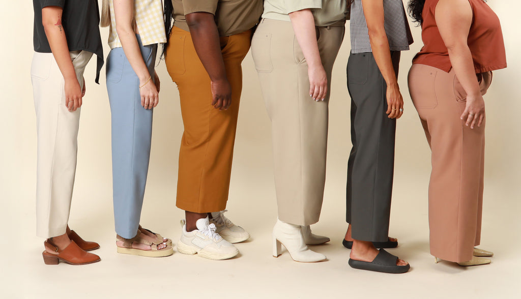 group of various sized models wearing sustainable aire flex fabric. featuring the shift and snap tank and jetsetter trouser made for travel.