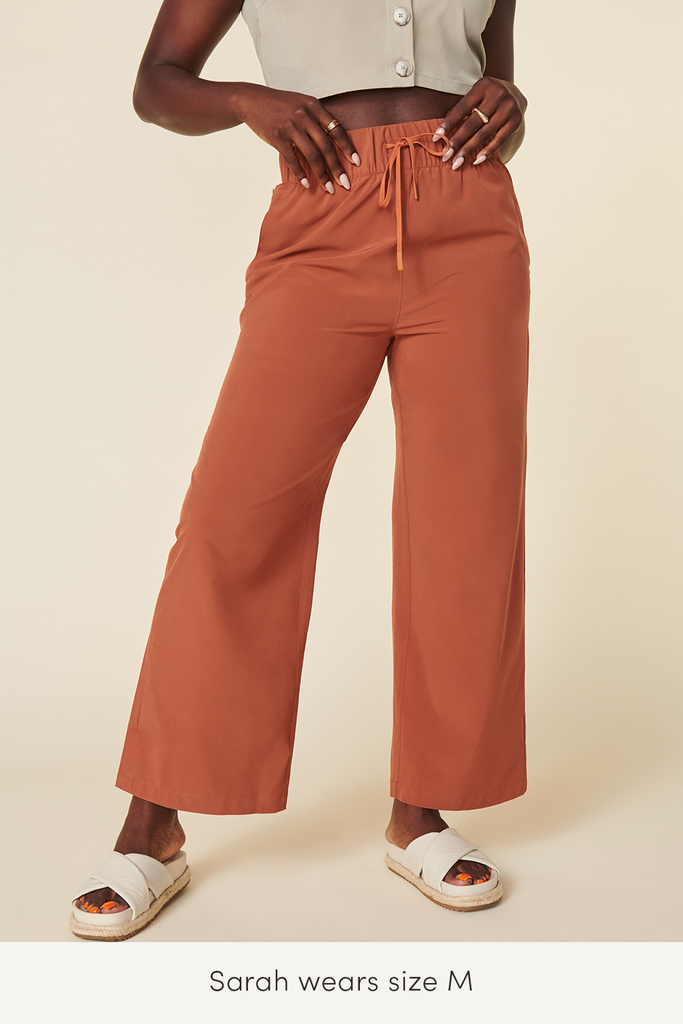 medium size travel pants in rust color