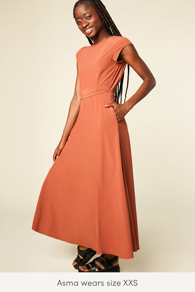 clay rust color travel dress with pockets from wayre